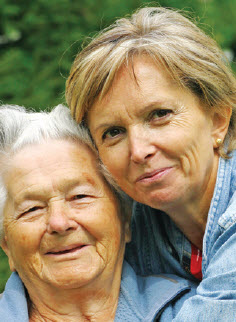 Older woman and daughter smiling
